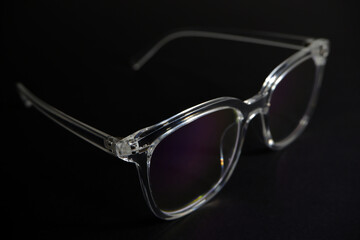 transparent eye wear closeup shot on black background 