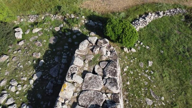 Aerial view of the Giant&rsquo;s Tomb of Sa Domu 'e s&rsquo;Orcu, a Bronze Age megalithic tomb nuraghe