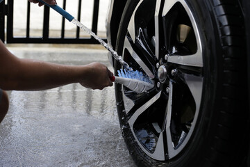 Washing car, cleaning tires and wheels