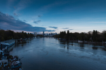 Seine embankment at the evening and night. Spring in Paris. Blossom and architecture. Insects and flowers. High resolution photo.	