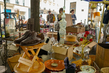 summer flea market and antique street sale in the Marais district in Paris , France