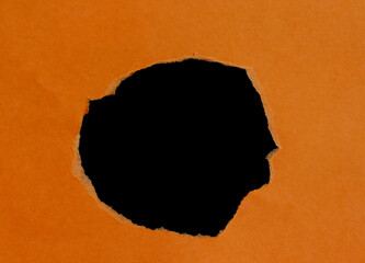 torn ripped paper on black background with space for your message in your work.