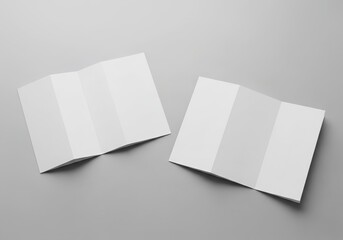 Two blank, open, tri-fold brochures, white paper. Mockup for advertising, marketing, and promotion.