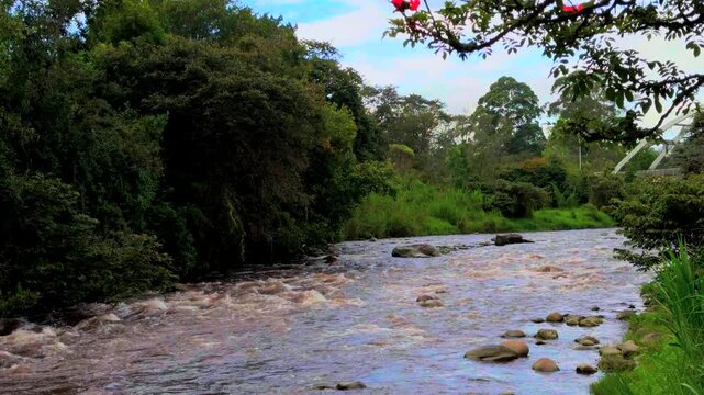 Cauca River passing through the city of Popayan in Colombia