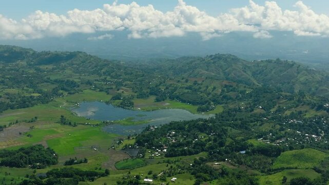 Lake Seloton surrounded by agricultural land and mountain rainforest. Lake Sebu. Mindanao, Philippines.