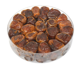 Dried dates in plastic box isolated on white background