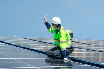 Engineer team installs solar cells check installation solar cell on the roof Sustainable energy industry concept Renewable energy solutions for climate change.