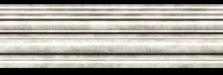 Ornate, light gray stone frieze with horizontal bands