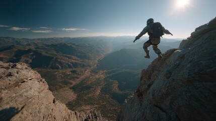 Obraz premium Extreme mountain pursuit: Soldier leaps across rocky precipice with scenic vista