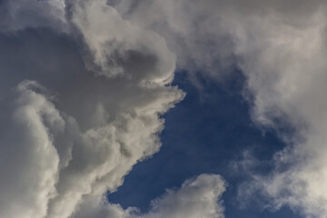 head of a man in the clouds
