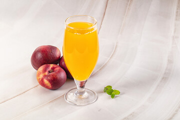 Vitamin beverage - peach juice glass