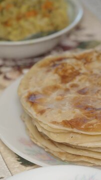 Delicious flatbread being prepared in a cozy kitchen