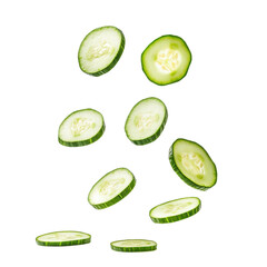 Fresh cucumber slices falling gracefully against a clean white background, Cucumber slices in plateisolated on white background