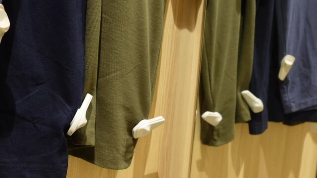 Retail tags secure clothing items in store display