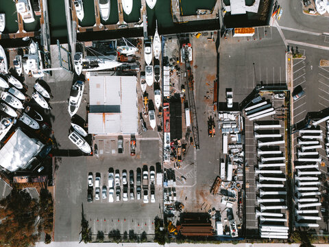 Straight down view of a boat yard next to harbor
