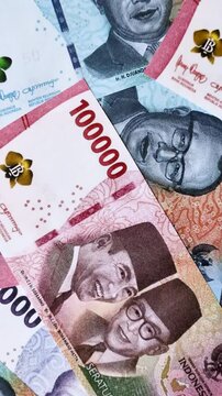 Rupiah money, Indonesian banknotes for buying and selling goods and exchanging for other currencies. Background in the form of Indonesian money