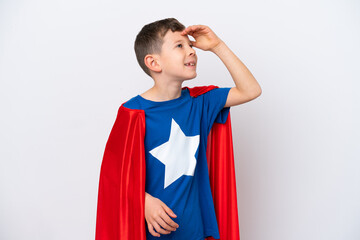 Super Hero little boy isolated on white background smiling a lot © luismolinero