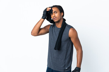 Fototapeta premium Young African American man with braids isolated on purple background with sport towel