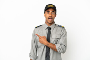 African American safeguard over isolated white background surprised and pointing side