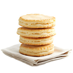 Buttery golden biscuits stacked high on linen napkin
