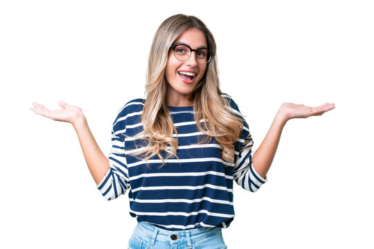 Young Uruguayan woman over isolated background with shocked facial expression