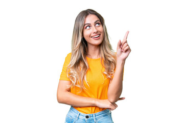 Young Uruguayan woman over isolated background pointing up a great idea