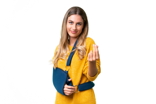 Young Uruguayan woman with broken arm and wearing a sling over isolated background making money gesture