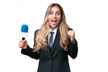 Young pretty Uruguayan tv presenter over isolated background celebrating a victory in winner position