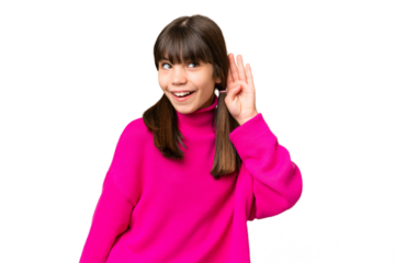 Little caucasian girl over isolated background listening to something by putting hand on the ear