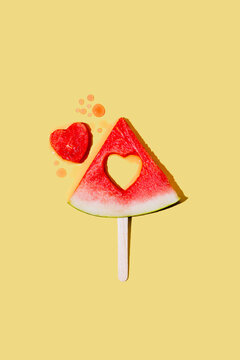 Abstract summer fruit background. Fresh watermelon slice on yellow