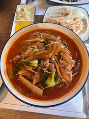 Spicy and numbing malatang with a mix of fresh ingredients in rich Sichuan broth, paired with crispy and tangy guobaorou. A perfect balance of bold heat and sweet-sour crunch for a satisfying feast.