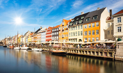 Colorful traditional houses in the Old port of Nyhavn in Copenhagen, Denmark. Nyhavn port is a popular travel destination and main landmark of Copenhagen city