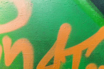 bright colorful pattern of beautiful street wall with art graffiti background. Vivid modern urban texture for wallpaper and design