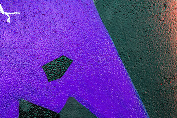 Art under ground. Beautiful street art graffiti background. The brick wall is decorated with abstract drawings house paint. Modern style urban culture of street youth. Abstract picture on wall