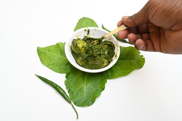 Indian Spinach and Potato Curry. Indian vegetable curry with spinach and potato. A dry dish made from fried potatoes and spinach in Indian style. 
