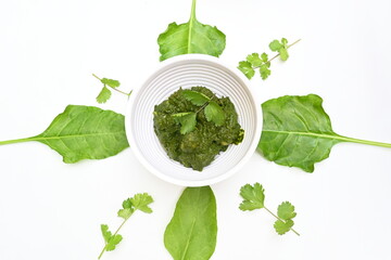 Indian Spinach and Potato Curry. Indian vegetable curry with spinach and potato. A dry dish made from fried potatoes and spinach in Indian style. 
