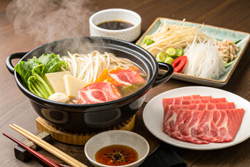 Fototapeta premium A Guide to Shabu Shabu Japanese Hot Pot Cuisine