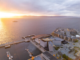 Trondheim, Norway, sunset over the fjord, Munkholmen and the new development area near the harbor