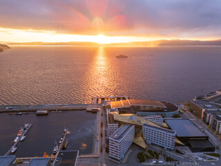 Trondheim, Norway, sunset over the fjord, Munkholmen and the new development area near the harbor