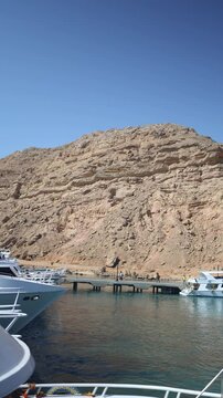 waterfront, no people, vacations, wealth, seascape, aerial view, enjoyment, panoramic, ship, journey, joy, luxury, routine, horizontal, transportation, sail, harbor, sailing, sand, teal, sailboat, yac