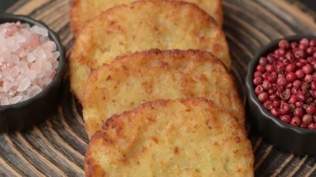 Potato hash browns, a meal with onions, cabbage in the form of fritters. Vegetable healthy breakfast