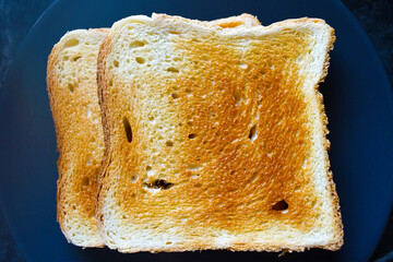 Toast bread slices on a plate.