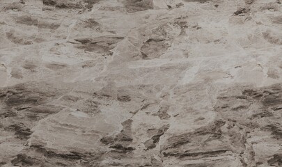 Textured stone surface with varied shades of gray and brown