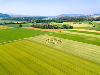 Canton Bern, Switzerland - July 05, 2019: mysterious crop circle emerged overnight in wheat field...