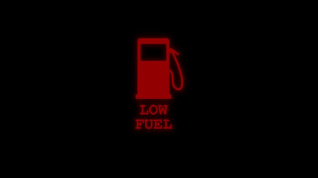Low fuel symbol icon animation on a black background