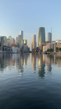 Stunning view of Millwall outer dock with Canary Wharf skyscrapers in the background