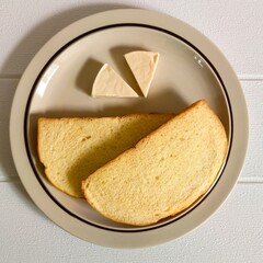Sweet Hawaiian Bread Slices with Butter on Plate