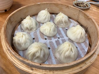 Freshly Steamed Xiaolongbao Soup Dumplings in Bamboo Steamer