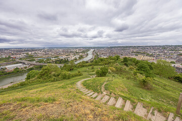 Wide view over Rouen with Lacroix Island in the middle of the Seine and the old city to the right, seen from the Saint Catherine viewpoint