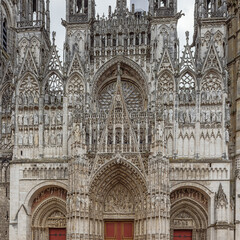 Rich decorations above the entrance of the Notre Dame Cathedral in Rouen with features from Early Gothic to late Flamboyant and Renaissance architecture